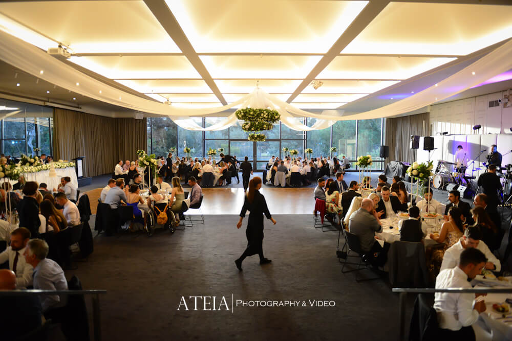 A beautifully decorated wedding reception at Leonda by the Yarra Ballroom, with tables and chairs arranged for guests.