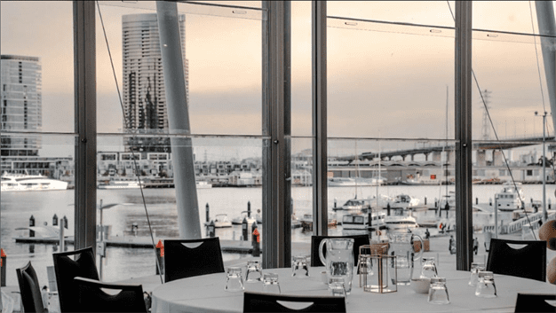 Get together in style at the Promenade Docklands Harbourview Room. This room offers ample space with tables and chairs for your comfort.