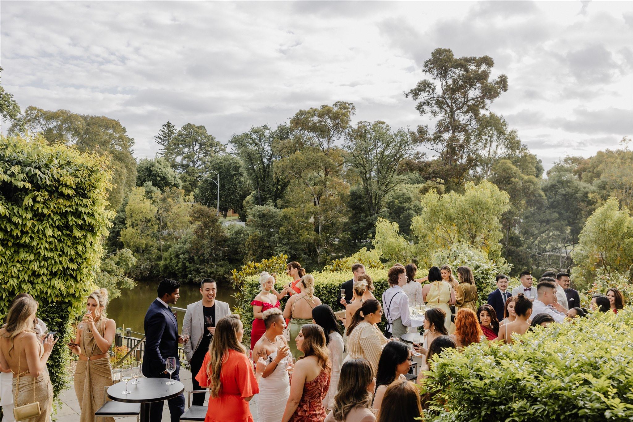 A summer setting of guests outdoors celebrating their valedictory at a Melbourne venue perfect for school events