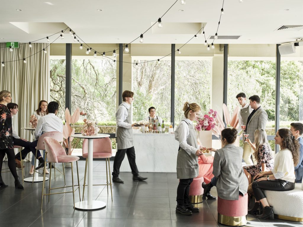 Cocktail lounge with stylish décor, dim lighting, and a chic, modern atmosphere, perfect for events in Melbourne.