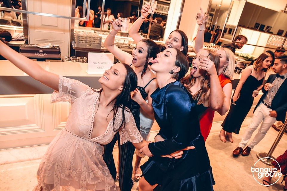 Girls posing for a selfie at their University Ball event in Melbourne